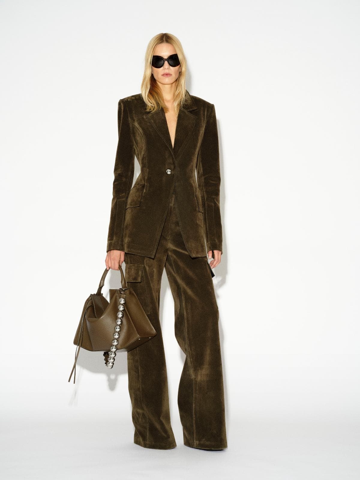 LAFORMELA Vintage Effect olive velvet tailored blazer and matching cargo pants styled with geometric luxury handbag MIXMVSE London