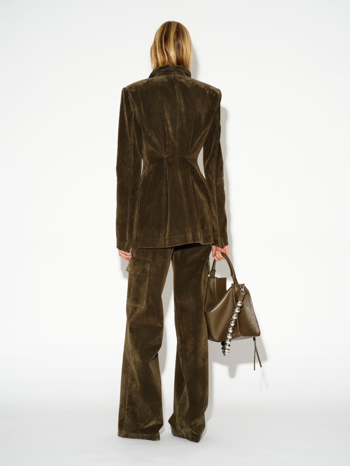 LA FORMELA Vintage Effect olive velvet tailored blazer and matching cargo pants styled with geometric luxury handbag MIXMVSE London