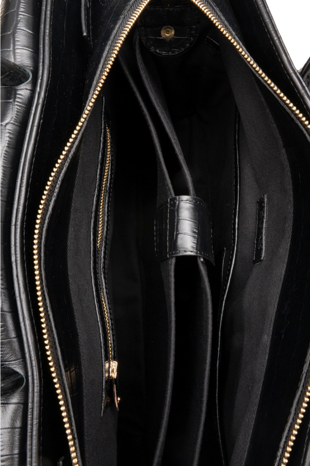 Du'Mo Portfolio Bag in black leather. Interior view showing lining, gold zips and internal pockets. Independent Ukrainian designer at MIXMVSE London.