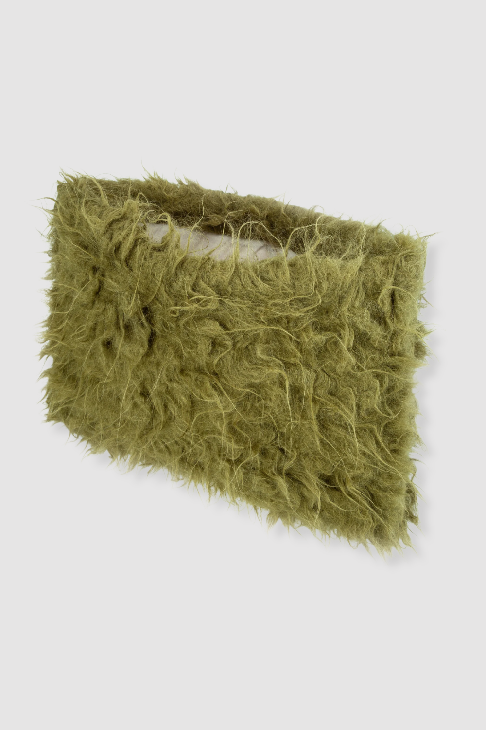 KARPOVA fluffy XL clutch bag in green merino wool. Independent Ukrainian designer at MIXMVSE London.
