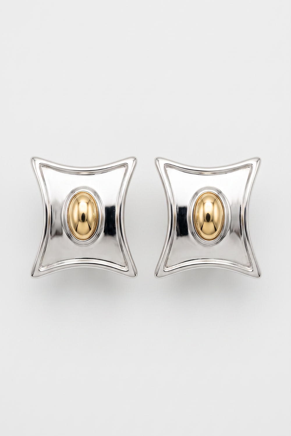 Chuk Form earrings in silver from the FORM collection, rhodium-plated brass with a leather-like texture. Ukrainian designer jewellery at MIXMVSE London.