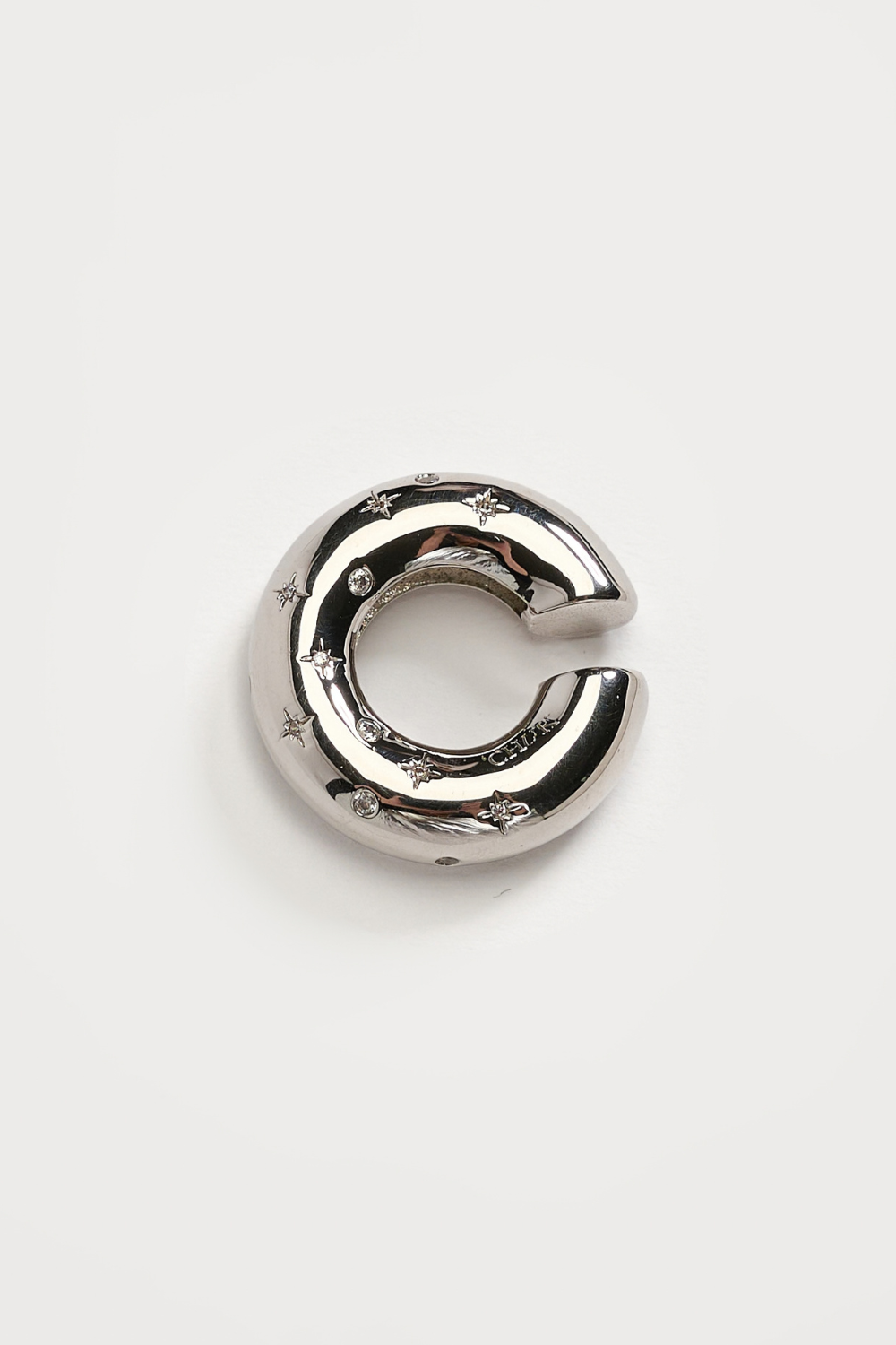Chuk Raw Desire ear cuff in silver rhodium-plated brass with cubic zirconia. Ukrainian designer jewellery at MIXMVSE London.