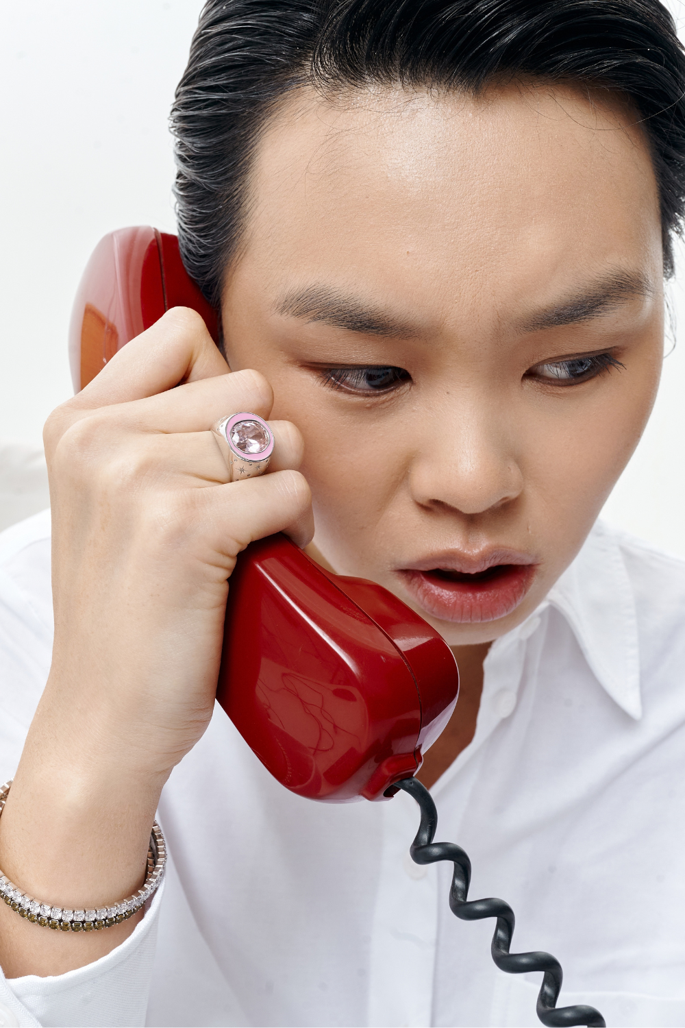 Chuk silver Raw Desire ring with pink stone worn on the hand. Ukrainian designer jewellery at MIXMVSE London.