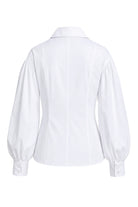 Ambitna white cotton shirt with wide sleeves, styled view. Independent Ukrainian designer at MIXMVSE London.
