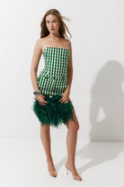 Cultnaked Vixen Shorts in green gingham. Front view of high-waisted cotton-lyocell shorts with belt loops. Independent Ukrainian designer at MIXMVSE London.