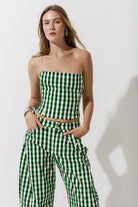 Cultnaked Vixen Bandeau Corset Top in green gingham. Side view with concealed zip closure. Made in Ukraine, at MIXMVSE London.
