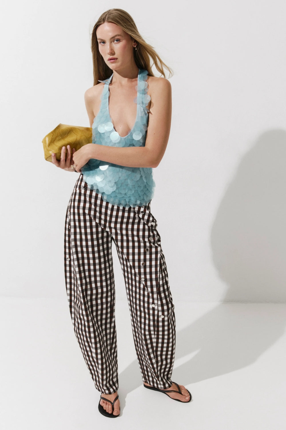 Cultnaked Paloma Top in aqua blue. Side view of halter neckline. Available at MIXMVSE London concept store.