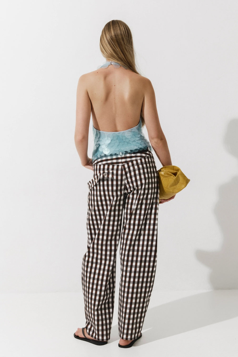 Cultnaked Barrel Pants in brown. Side view of barrel-leg silhouette with concealed zip. Made in Ukraine, at MIXMVSE London.