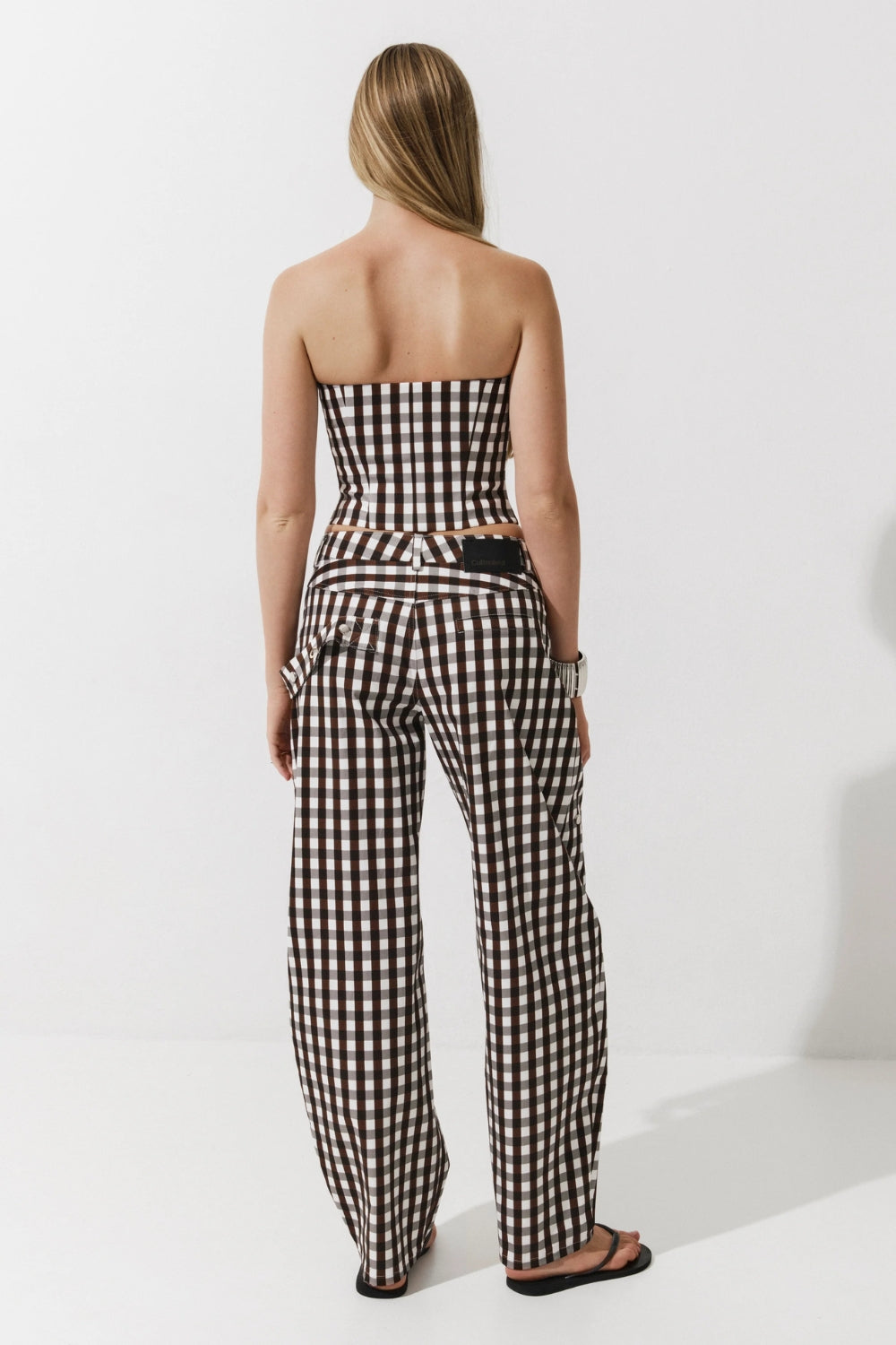 Cultnaked Bandeau Corset Top in brown gingham. Back view of bandeau corset top. Available at MIXMVSE London concept store.