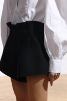 Ambitna black wool and silk mini shorts, styled full look. Independent Ukrainian designer at MIXMVSE London.
