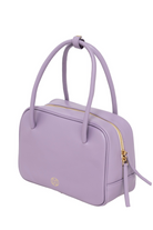 Du'Mo Poise Small Bag in smooth lilac calf leather. Three-quarter view showing the gold two-way zip. Independent Ukrainian designer at MIXMVSE London.