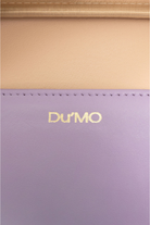 Du'Mo Poise Small Bag detail of the gold Du'Mo logo on lilac leather with cotton lining. Independent Ukrainian designer at MIXMVSE London.