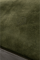 Du'Mo Portfolio Bag close-up of olive green suede with smooth leather trim. Independent Ukrainian designer at MIXMVSE London.