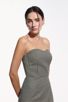 Ambitna plaid wool dress in black and white, side view. Independent Ukrainian designer at MIXMVSE London.