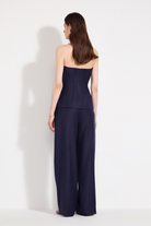 L'eskizzo navy pinstripe corset and palazzo trousers styled together. Independent Ukrainian designer at MIXMVSE London.