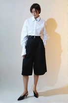 Ambitna classic long-sleeved shirt in white cotton with straight point collar. Independent Ukrainian designer at MIXMVSE London.