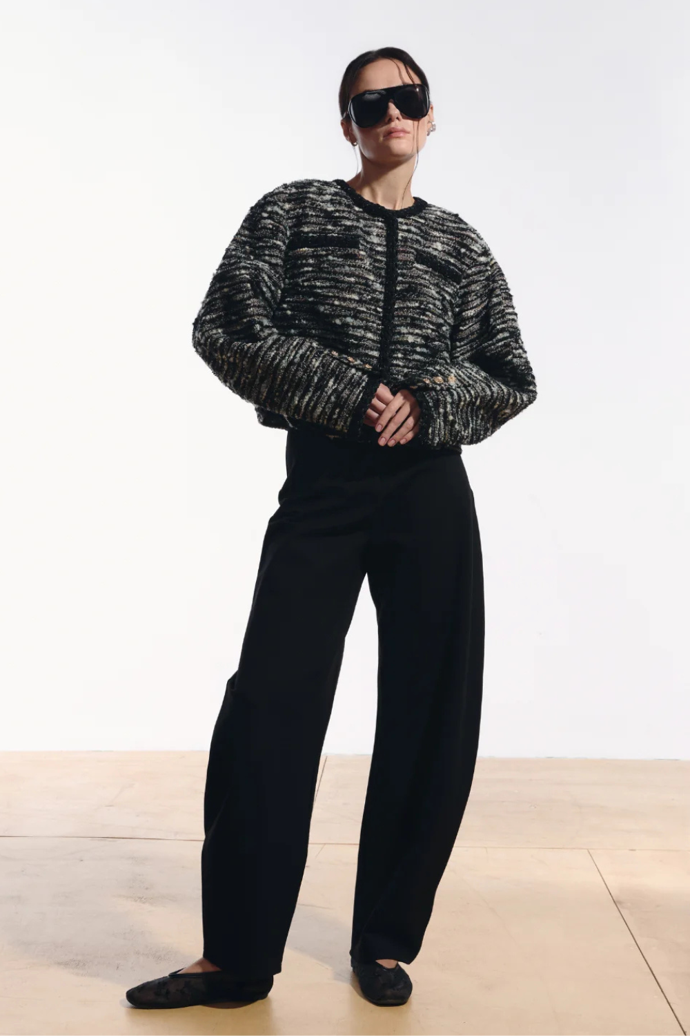 Ambitna barrel-leg trousers in black with rounded volume through the leg. Independent Ukrainian designer at MIXMVSE London.