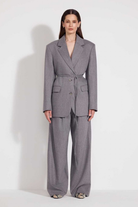 L'eskizzo ModenaAsh ash grey wool blazer worn on model. Independent Ukrainian designer at MIXMVSE London.