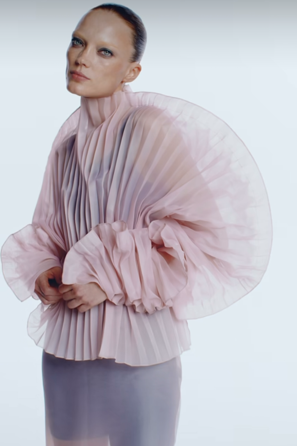 J'amemme Alisha pink top showing the hand-pleated fabric. Independent Ukrainian designer at MIXMVSE London.