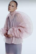 J'amemme Alisha pink top showing the hand-pleated fabric. Independent Ukrainian designer at MIXMVSE London.