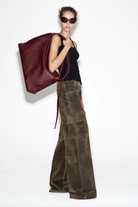 LAFORMELA olive velvet denim cargo pants worn on model. Independent Czech designer from Prague at MIXMVSE London.