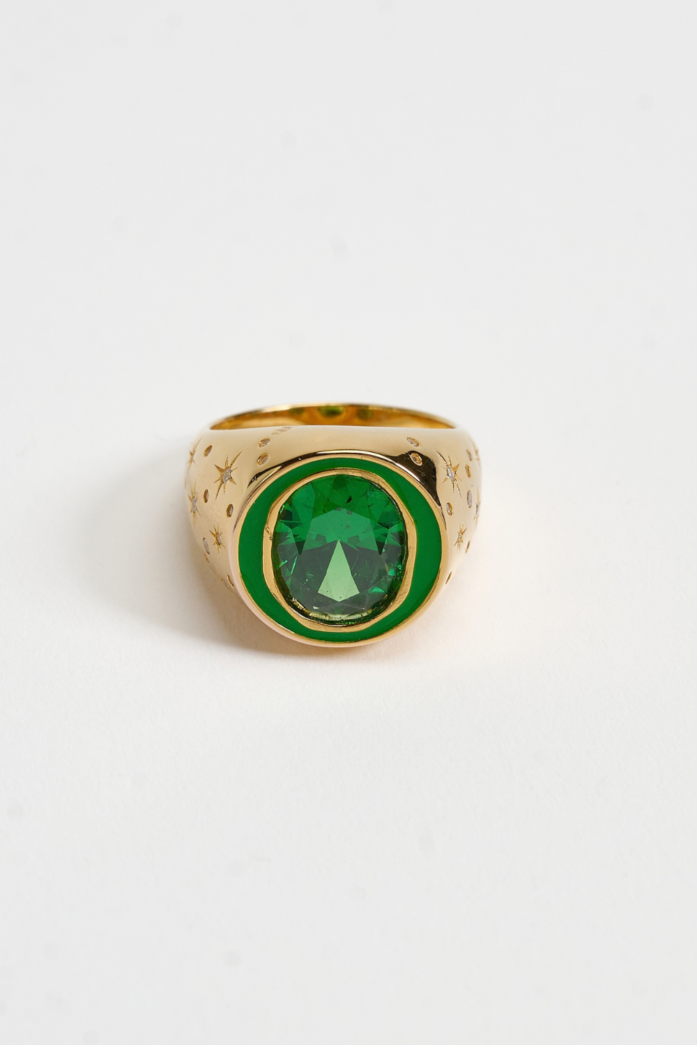 Chuk Raw Desire ring in 18K gold-plated sterling silver with enamel and an emerald-green cubic zirconia. Ukrainian designer jewellery at MIXMVSE London.