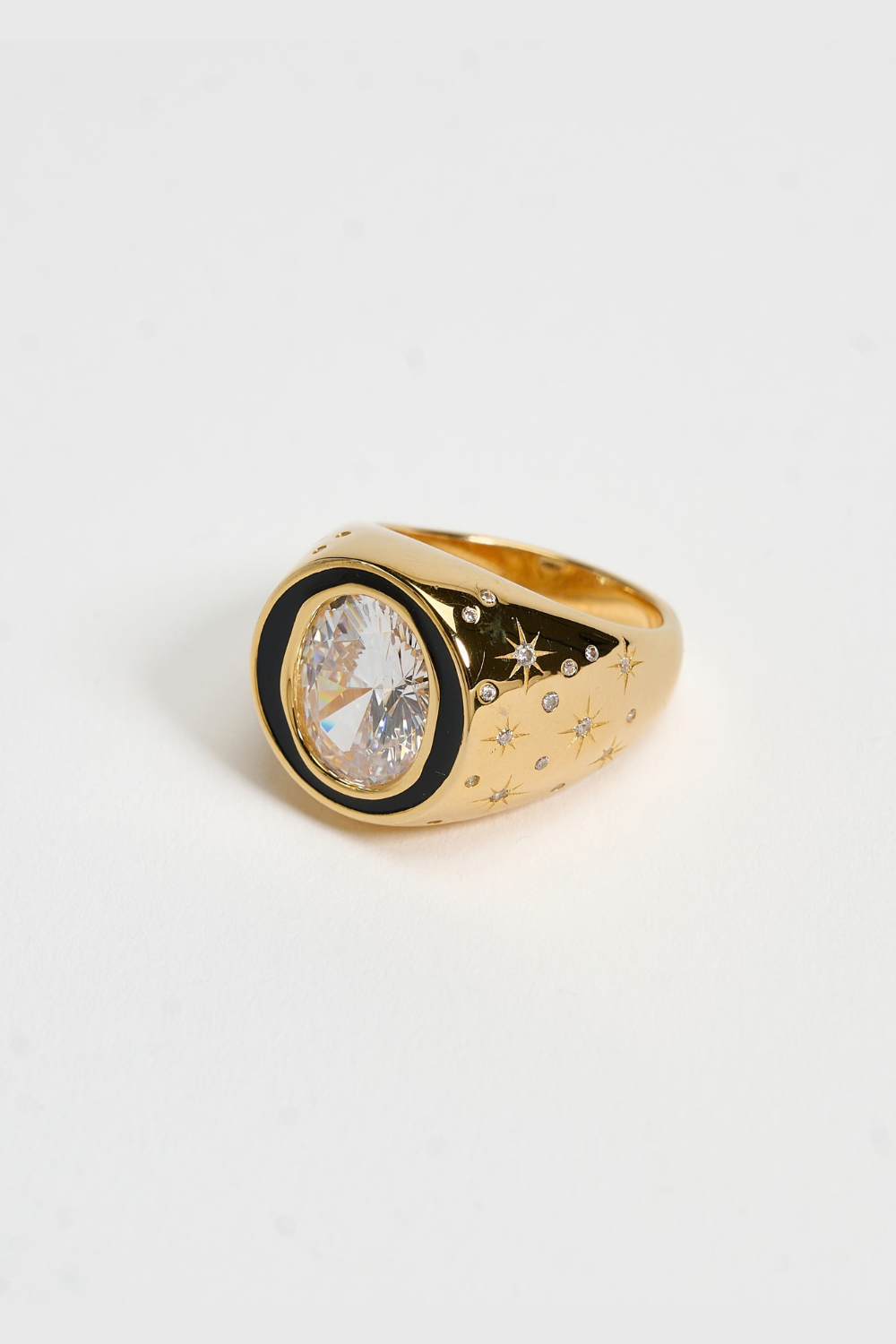 Chuk Raw Desire ring in 18K gold-plated sterling silver with black enamel and a clear cubic zirconia. Ukrainian designer jewellery at MIXMVSE London.