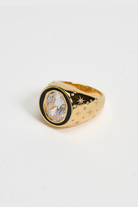 Chuk Raw Desire ring in 18K gold-plated sterling silver with black enamel and a clear cubic zirconia. Ukrainian designer jewellery at MIXMVSE London.