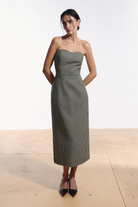 Ambitna plaid dress in black and white wool, front view of the boned bodice. Independent Ukrainian designer at MIXMVSE London.