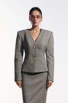 Ambitna grey tweed jacket, side view. Independent Ukrainian designer at MIXMVSE London.