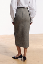 Ambitna grey tweed skirt, back view with the zip fastening. Independent Ukrainian designer at MIXMVSE London.