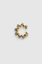 Chuk Spiral ear cuff in gold-gilded brass with cubic zirconia. Ukrainian designer jewellery at MIXMVSE London.