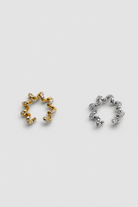 Chuk Spiral ear cuffs in gold and silver, styled together. Ukrainian designer jewellery at MIXMVSE London.