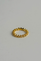 Chuk Spiral ring in 18K gold vermeil on 925 sterling silver with cubic zirconia. Ukrainian designer jewellery at MIXMVSE London.