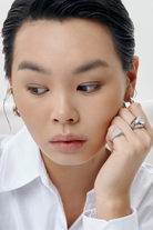 Chuk silver Raw Desire ring worn on the hand. Ukrainian designer jewellery at MIXMVSE London.